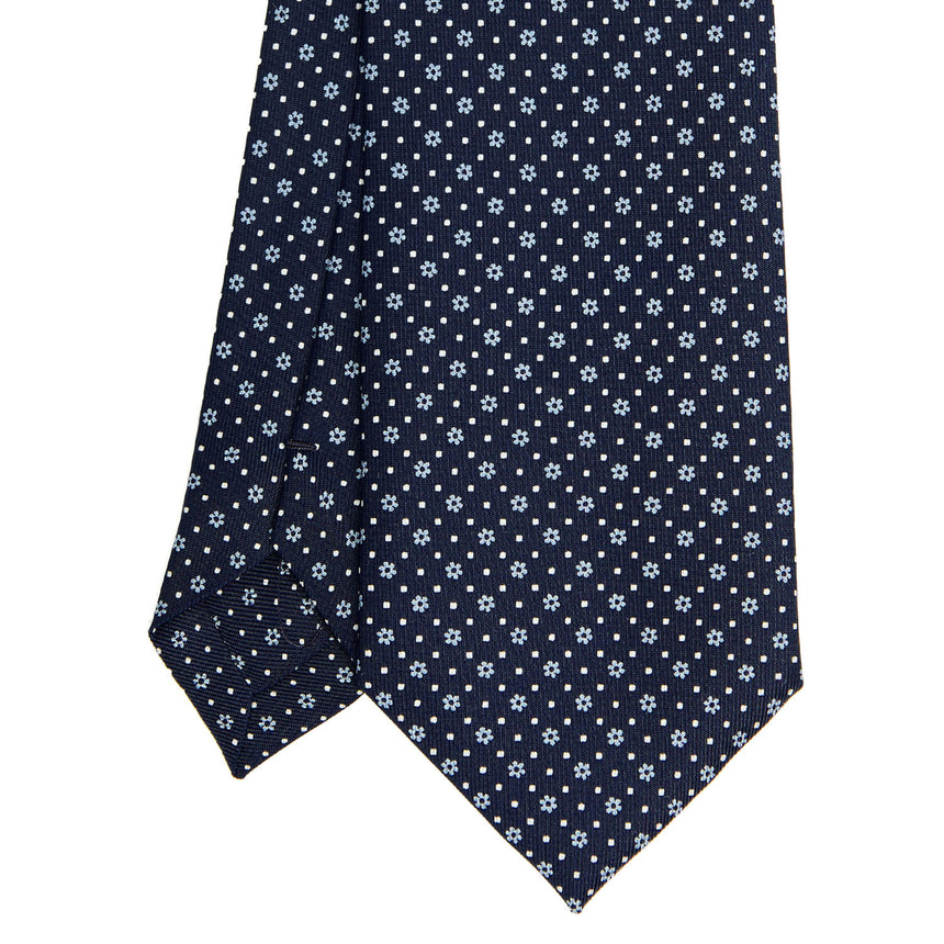 dark_blue_sartorial_classic_silk_tie_small_flower_pattern_tip_detail