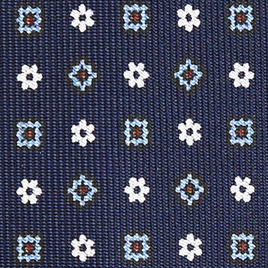 dark_blue_5_fold_sartorial_silk_tie_small_flower_pattern_fabric_pattern_detail