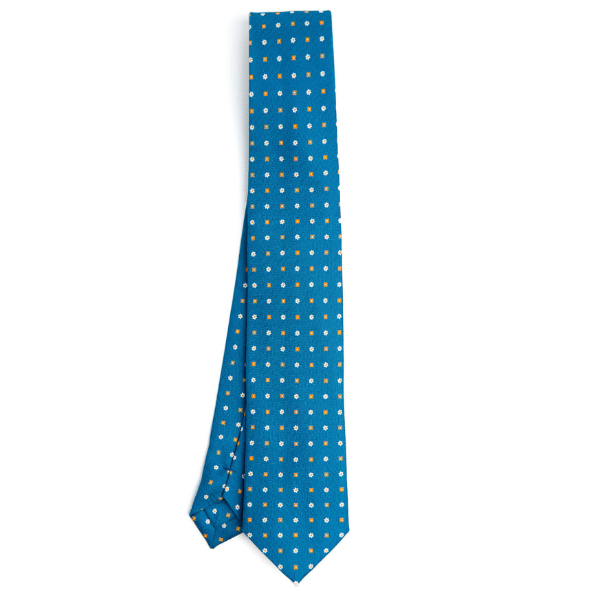mid_blue_sartorial_7_cm_silk_tie_small_flower_pattern_full_front_view