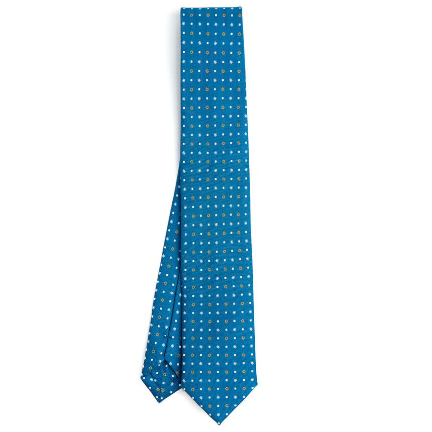 mid_blue_sartorial_7_cm_silk_tie_small_flower_pattern_full_front_view