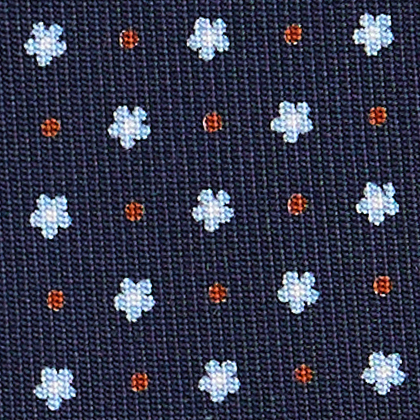 dark_blue_sartorial_7_cm_silk_tie_small_flower_pattern_fabric_detail