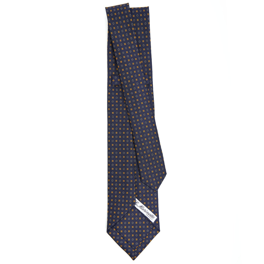 dark_blue_7_fold_sartorial_silk_tie_small_flower_pattern_full_back_view