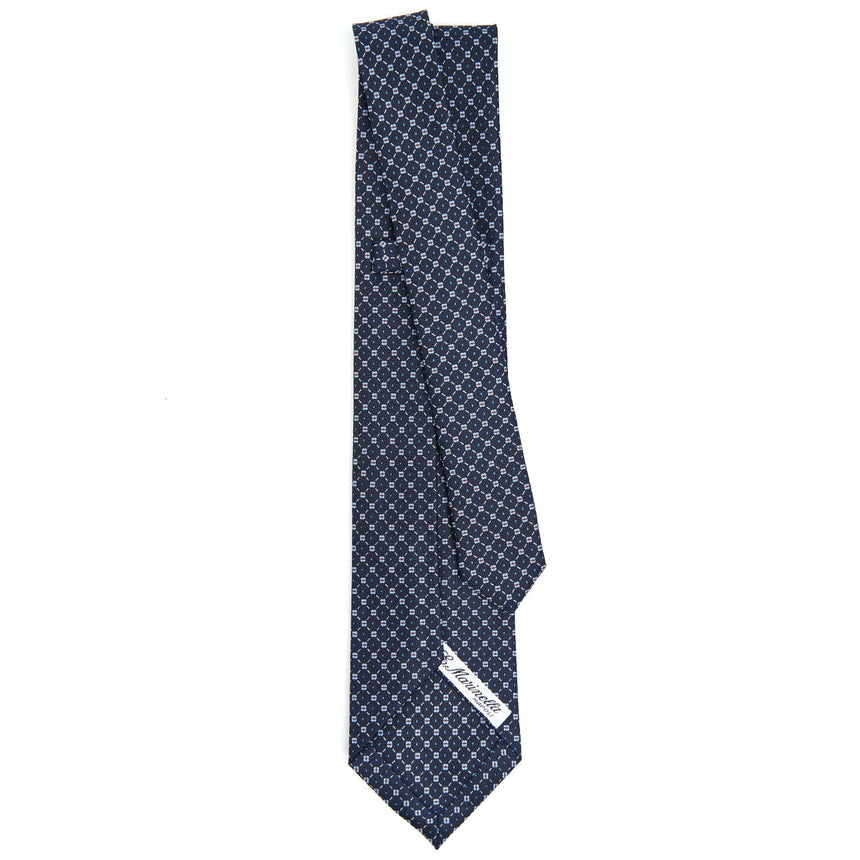 dark_blue_7_fold_sartorial_silk_tie_small_flower_pattern_full_back_view