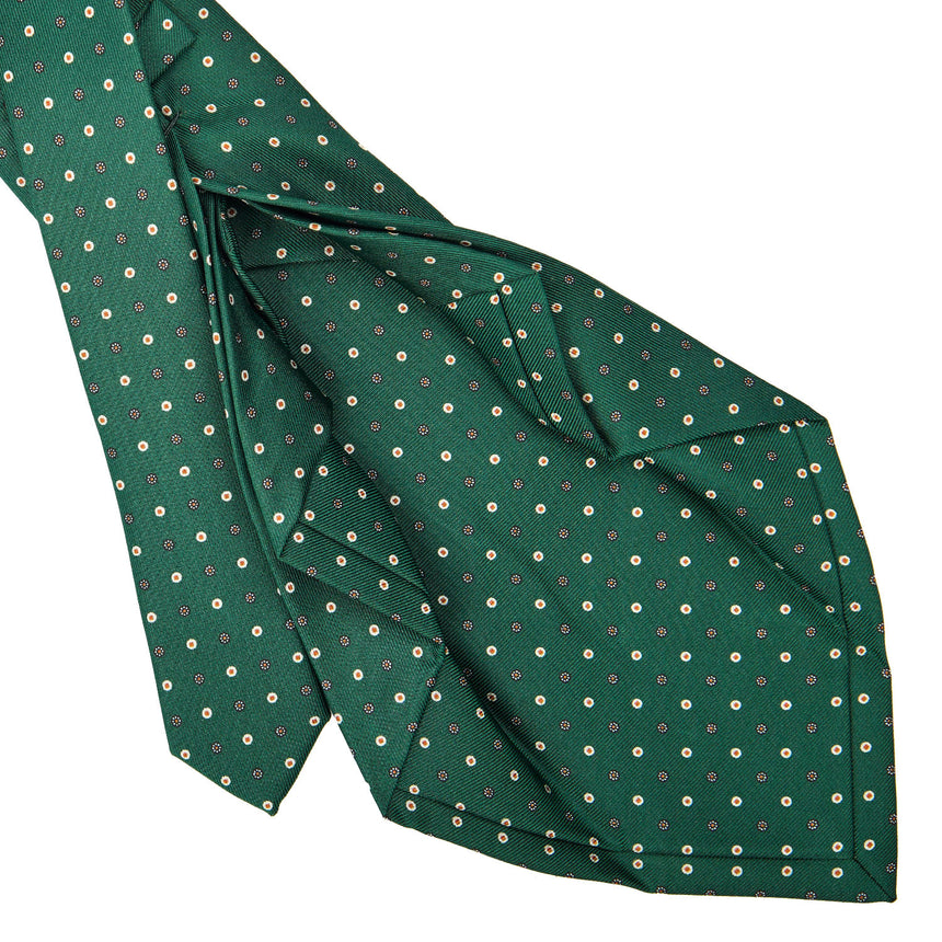 dark_green_7_fold_sartorial_silk_tie_small_flower_pattern_detail_of_the_back_pleats