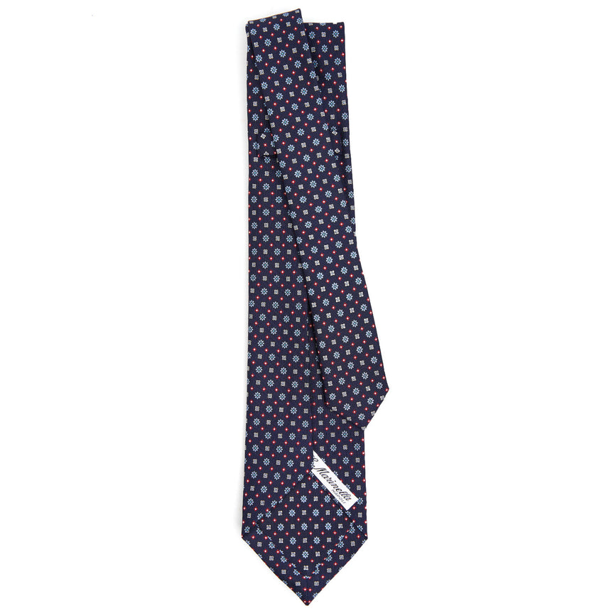 dark_blue_9_fold_sartorial_silk_tie_small_flower_pattern_full_back_view