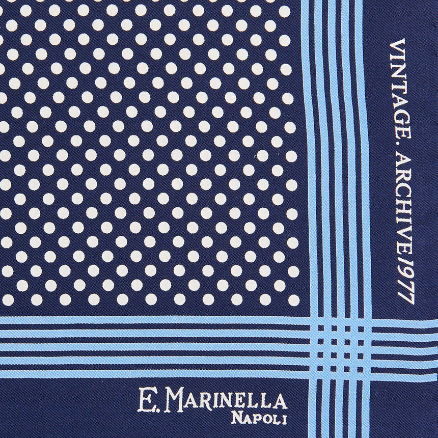 dark_blue_hand_printed_silk_pocket_square_polka_dot_pattern_logo_detail_with_hand_rolled_hem