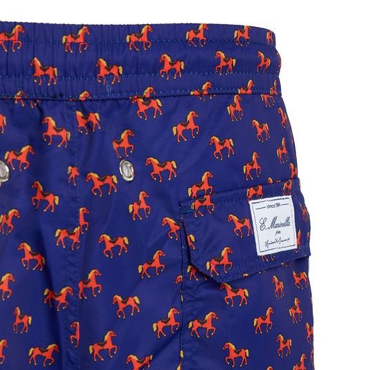 Close-up of the personalized label on the back of the Luciano De Crescenzo dark blue swimsuit.