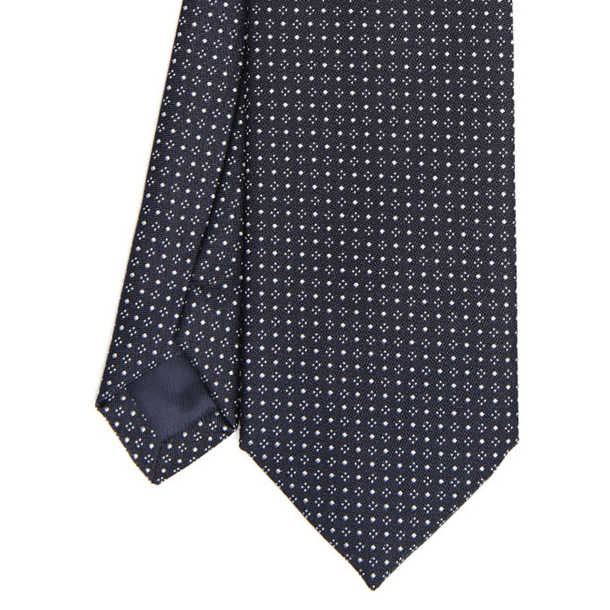 dark_blue_ceremonial_jacquard_silk_tie_small_geometric_pattern_tip_detail