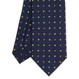 dark_blue_sartorial_classic_silk_tie_small_flower_pattern_tip_detail
