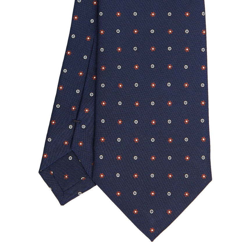 dark_blue_sartorial_classic_silk_tie_small_flower_pattern_tip_detail