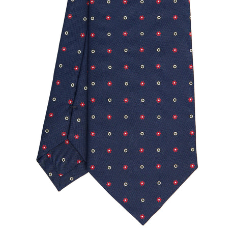 dark_blue_sartorial_classic_silk_tie_small_flower_pattern_tip_detail