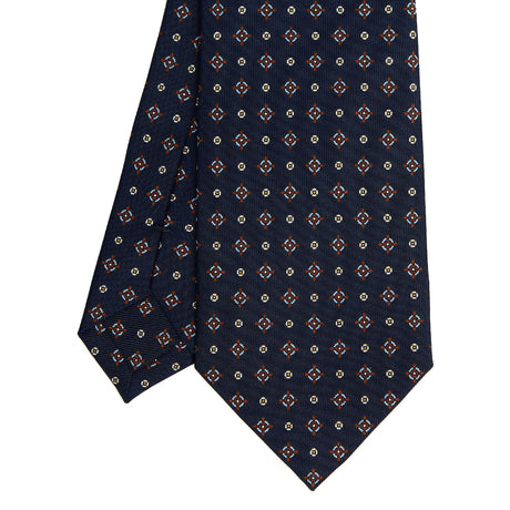 dark_blue_sartorial_classic_silk_tie_small_flower_pattern_tip_detail