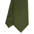 olive_green_classic_silk_tie_small_flower_pattern_tip_detail
