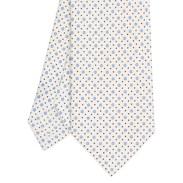 white_sartorial_classic_silk_tie_small_flower_pattern_tip_detail