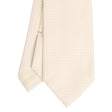 beige_ceremonial_jacquard_silk_tie_small_geometric_pattern_tip_detail