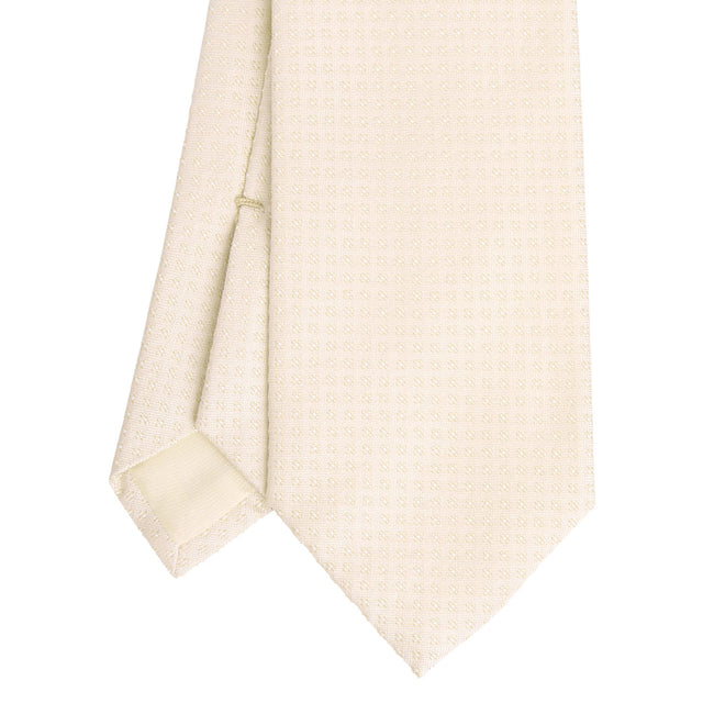 beige_ceremonial_jacquard_silk_tie_small_geometric_pattern_tip_detail
