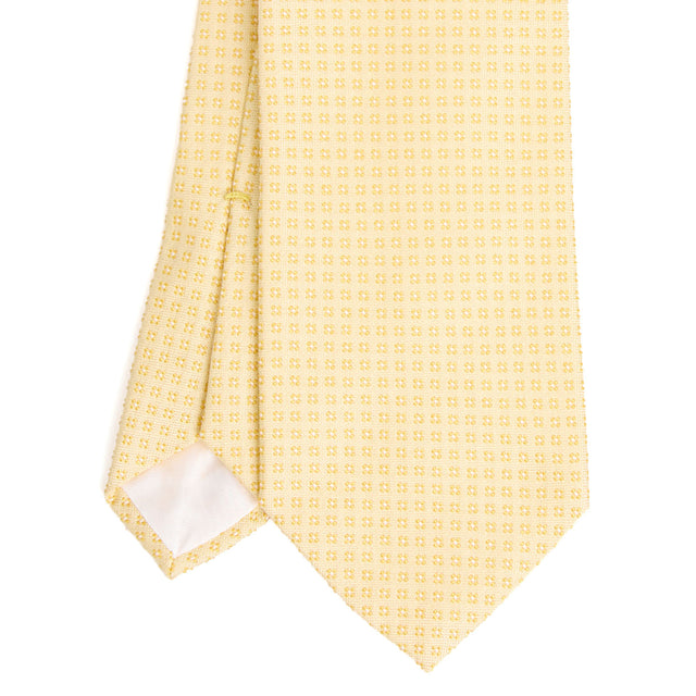 yellow_ceremonial_jacquard_silk_tie_small_geometric_pattern_tip_detail