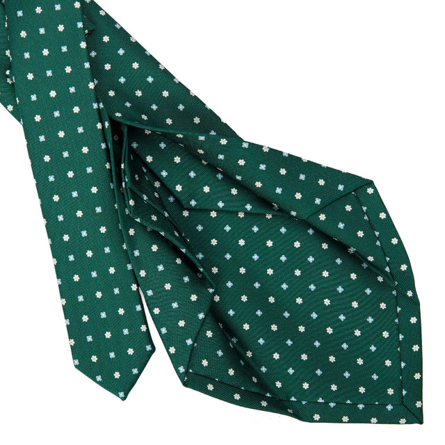 dark_green_5_fold_sartorial_silk_tie_small_flower_pattern_detail_of_the_back_pleats