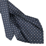 dark_grey_5_fold_sartorial_silk_tie_small_flower_pattern_detail_of_the_back_pleats