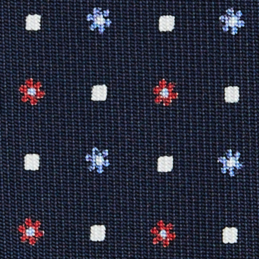 dark_blue_sartorial_7_cm_silk_tie_small_flower_pattern_fabric_detail