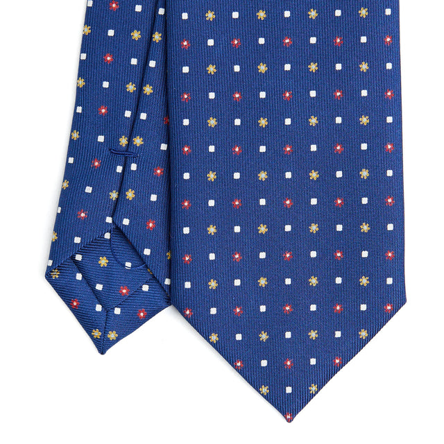 blue_sartorial_7_cm_silk_tie_small_flower_pattern_tip_detail