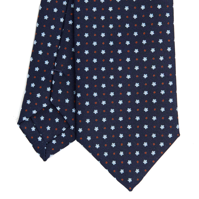 dark_blue_sartorial_7_cm_silk_tie_small_flower_pattern_tip_detail