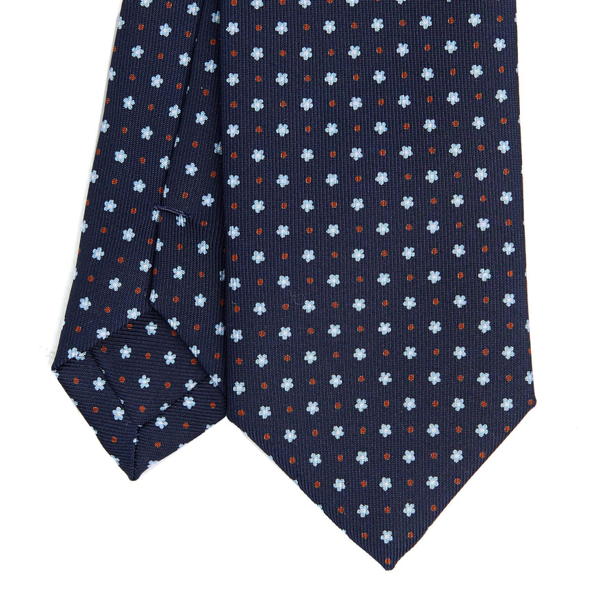 dark_blue_sartorial_7_cm_silk_tie_small_flower_pattern_tip_detail