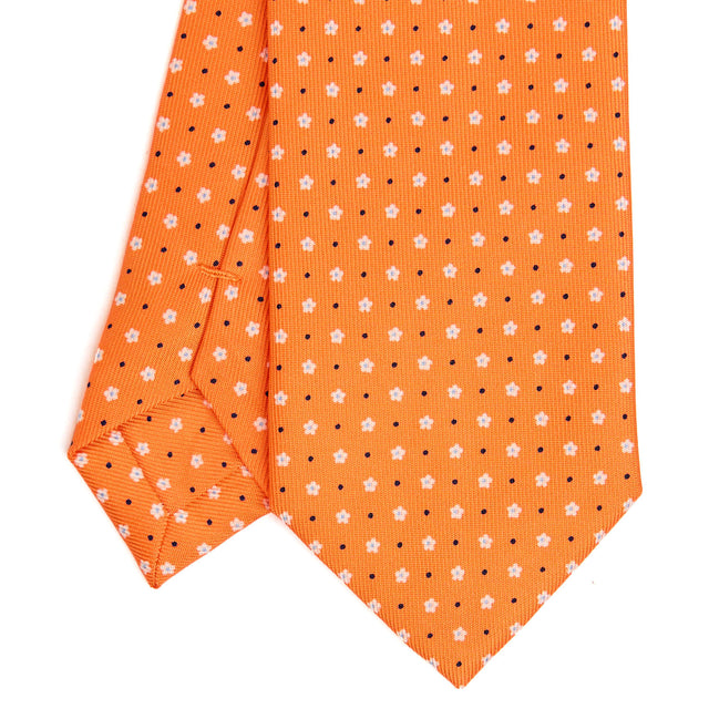 orange_sartorial_7_cm_silk_tie_small_flower_pattern_tip_detail