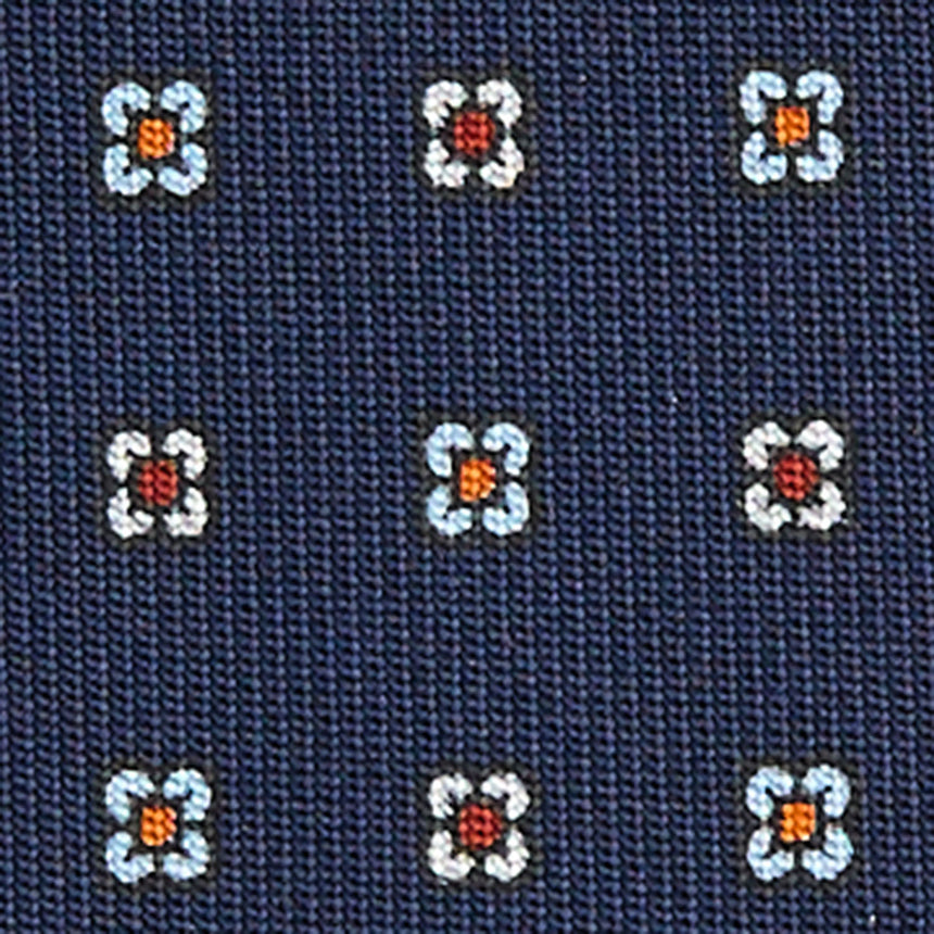 dark_blue_sartorial_7_cm_silk_tie_small_flower_pattern_fabric_detail