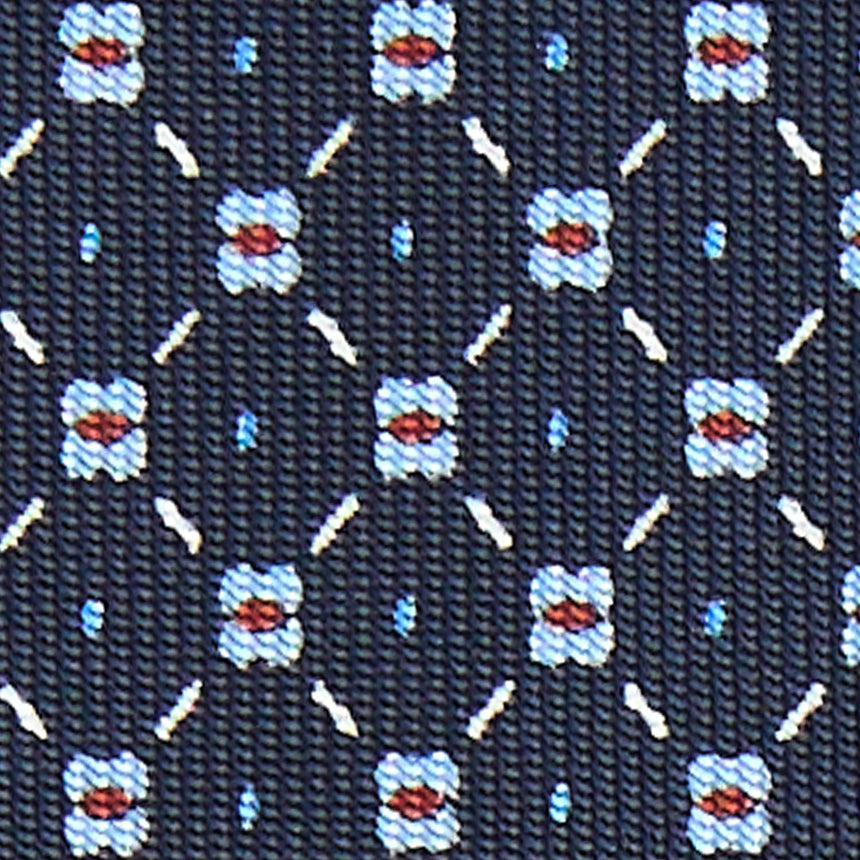 dark_blue_7_fold_sartorial_silk_tie_small_flower_pattern_fabric_pattern_detail