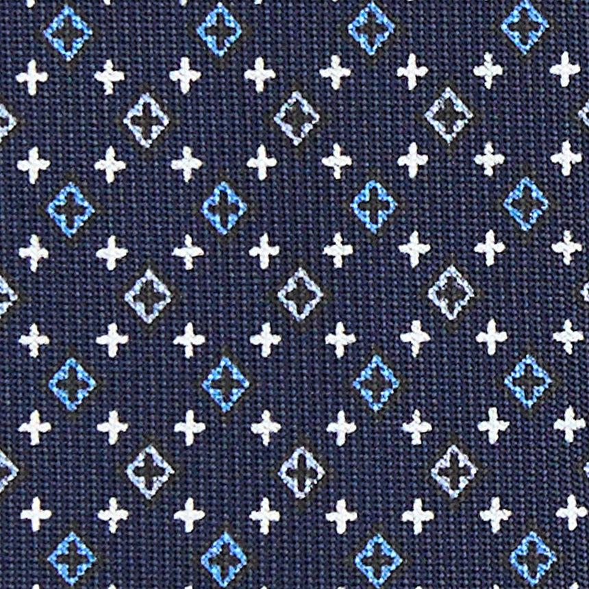 dark_blue_7_fold_sartorial_silk_tie_small_flower_pattern_fabric_pattern_detail