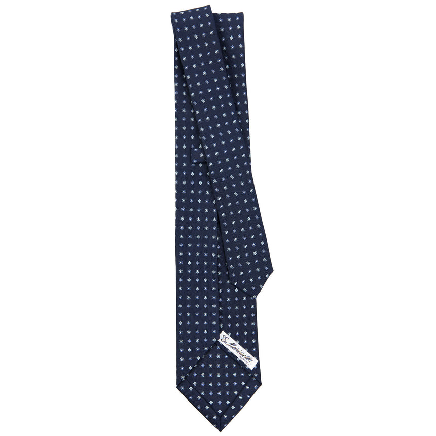 dark_blue_7_fold_sartorial_silk_tie_small_flower_pattern_full_back_view