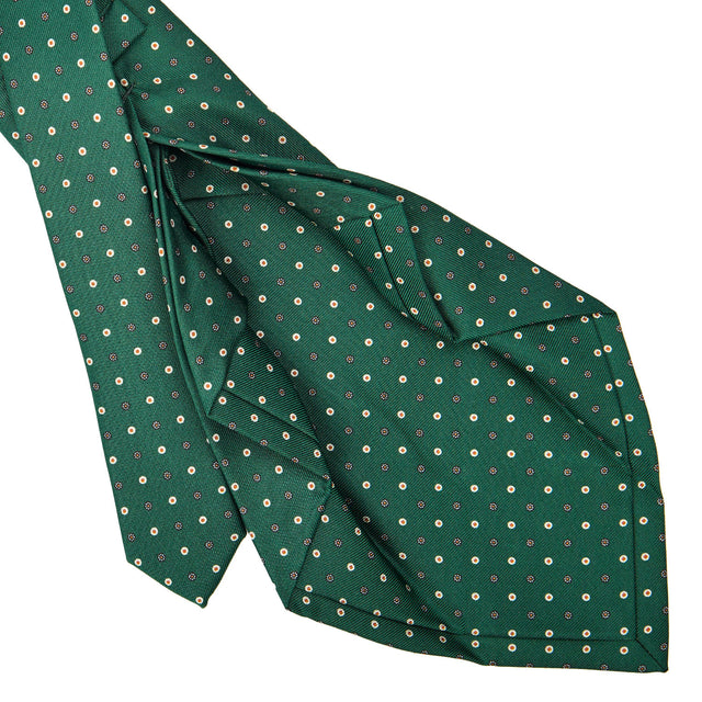 dark_green_7_fold_sartorial_silk_tie_small_flower_pattern_detail_of_the_back_pleats