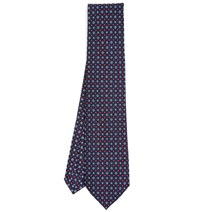 dark_blue_9_fold_sartorial_silk_tie_small_flower_pattern_full_front_view