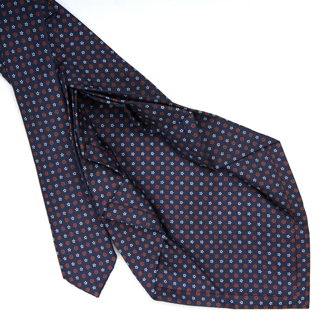 dark_blue_9_fold_sartorial_silk_tie_small_flower_pattern_detail_of_the_back_pleats