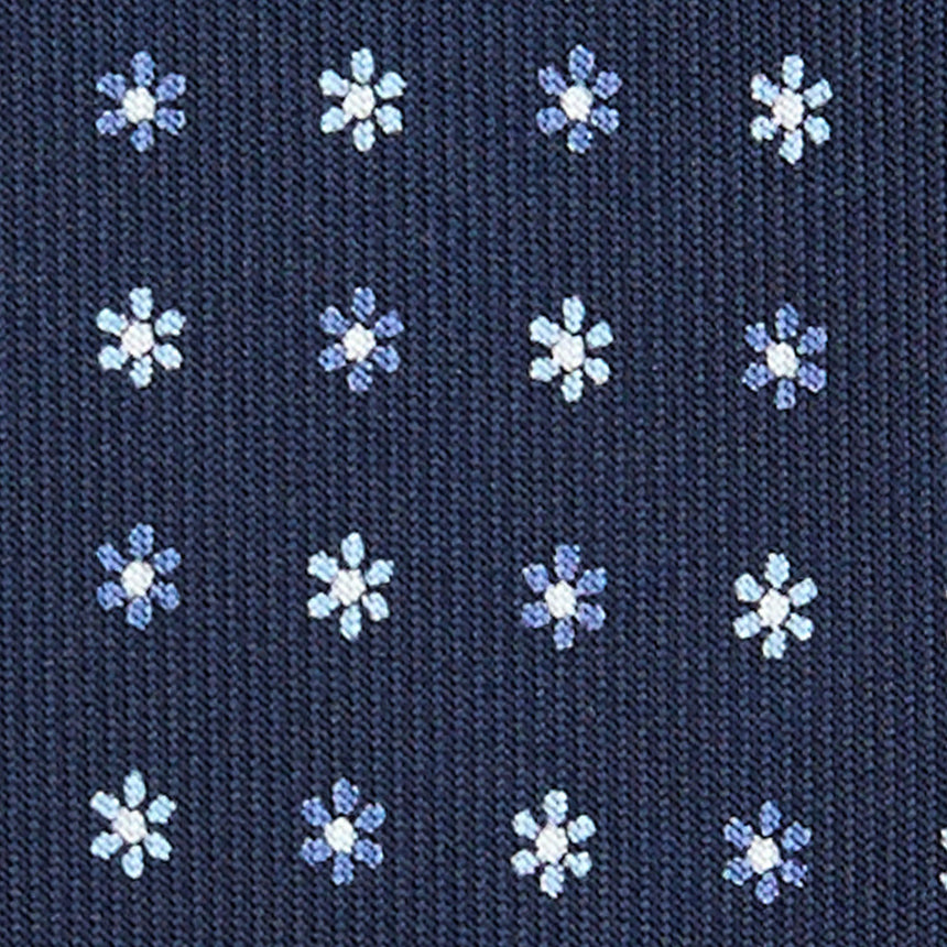 dark_blue_9_fold_sartorial_silk_tie_small_flower_pattern_fabric_pattern_detail