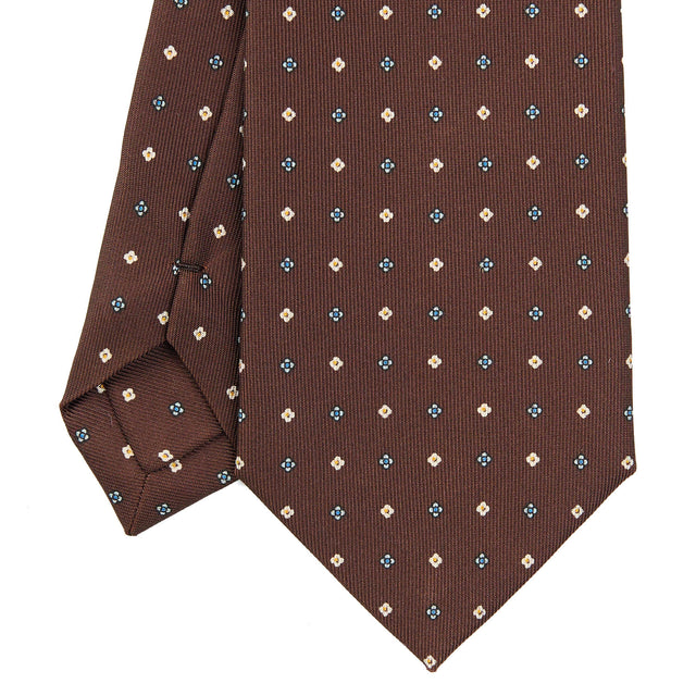 dark_brown_classic_silk_tie_small_flower_pattern_tip_detail