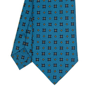 mid_blue_sartorial_classic_silk_tie_small_flower_pattern_tip_detail