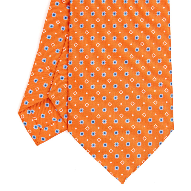 orange_extra_long_sartorial_silk_tie_small_flower_pattern_detail_of_the_back_pleats