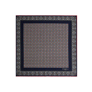 dark_blue_hand_printed_silk_pocket_square_large_flower_pattern_centered_and_folded